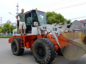 Rich and Adam, getting trips around the city by tractor. This kind of random thing happens in China.