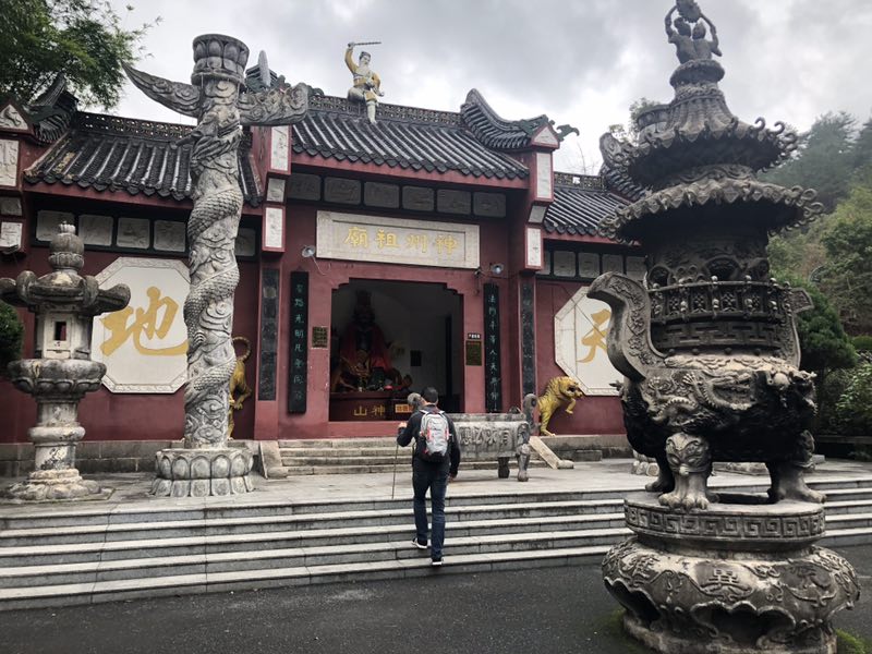 Michael outside a building in China